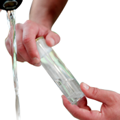 Hands holding a small bottle of water being tested