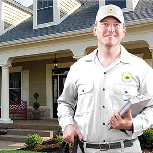 Service Man Service man standing in front of a home